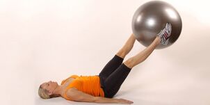 Catching a gymnastic ball between the raised legs develops the lower press